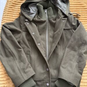 New York & Company green wool blend bomber jacket with a hood and ribbed cuffs